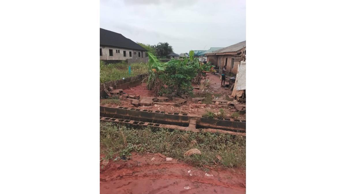 For Sale: 30ft × 120ft Fenced Plot in Developed Area – Ikola, Lagos